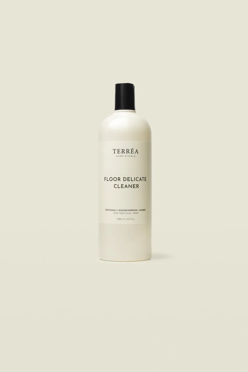 Bottle of Terrea Floor Delicate Cleaner on a light beige background