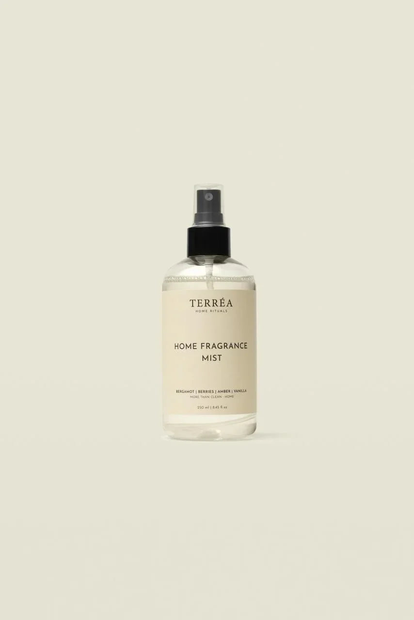 Eco-friendly home fragrance mist with bergamot, berries, amber, vanilla scents in minimalist bottle