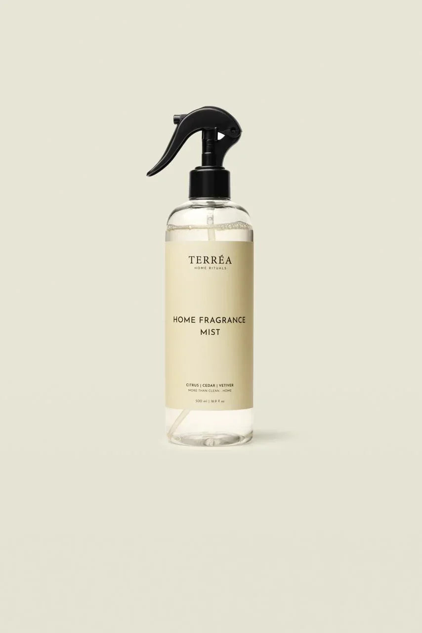 Eco-friendly home fragrance mist with citrus, cedar, vetiver scents in sleek spray bottle