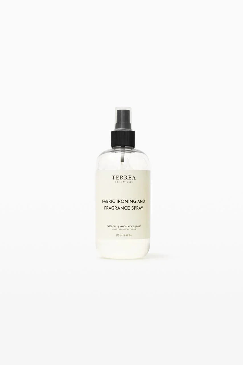 Clear spray bottle labeled &