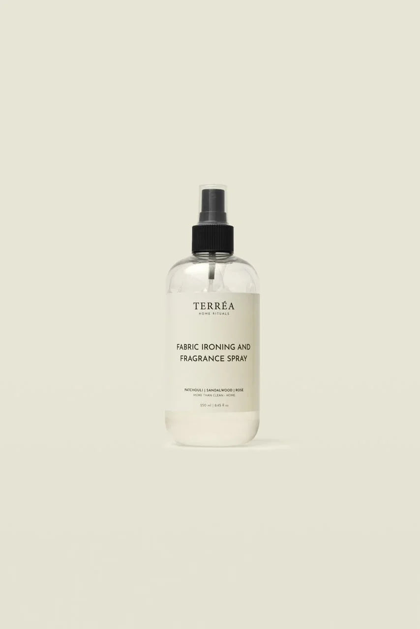 Fabric ironing and fragrance spray with patchouli, sandalwood, rose scents for home care rituals