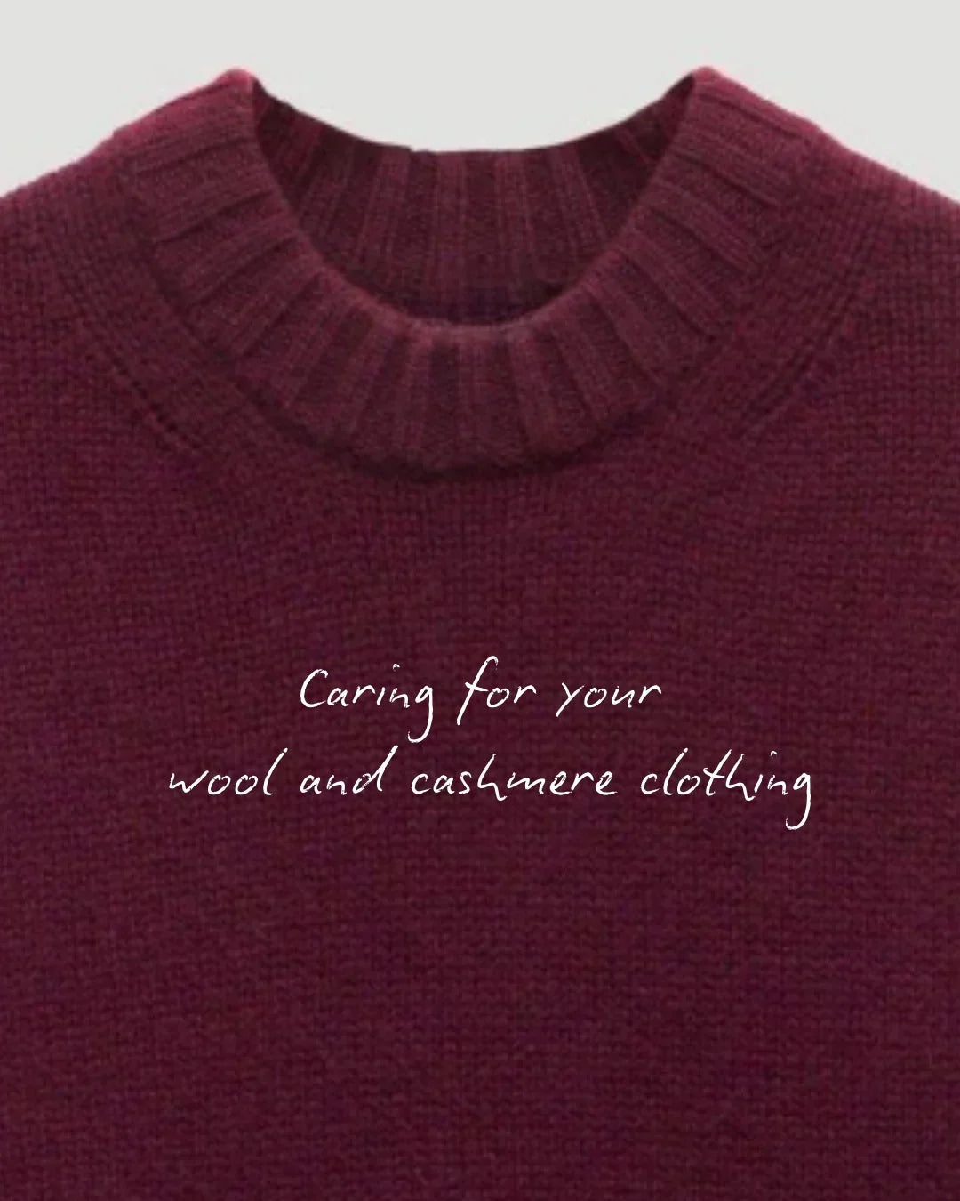Burgundy jumper with slogan about caring for wool and cashmere