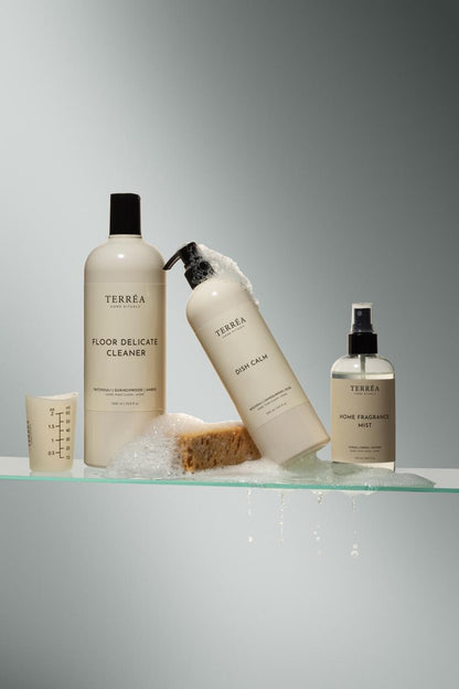 Set of Terrea cleaning products on a gray background