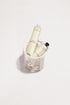 Terréa Hands Home Balm tubes placed inside a white ribbed basket on a clean white surface.