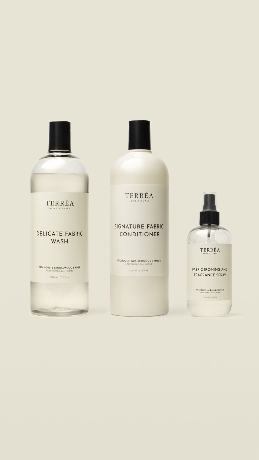 Three bottles of Terrea fabric care products on a white background