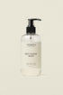 Terréa Soft Hands Wash bottle with black pump and minimalist cream label on a warm neutral background.