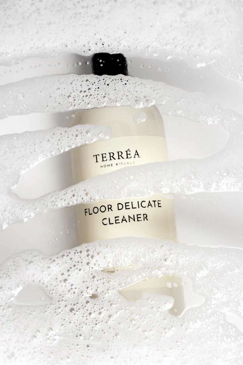 Terrea Floor Delicate Cleaner bottle on a white background with bubbles