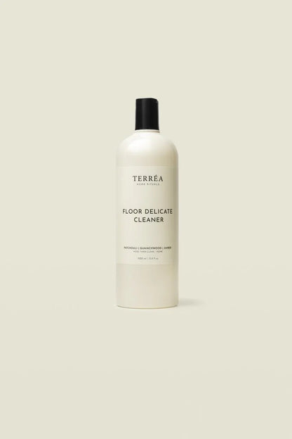 Bottle of Terrea Floor Delicate Cleaner on a light beige background