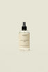 Eco-friendly home fragrance mist with bergamot, berries, amber, vanilla scents in minimalist bottle
