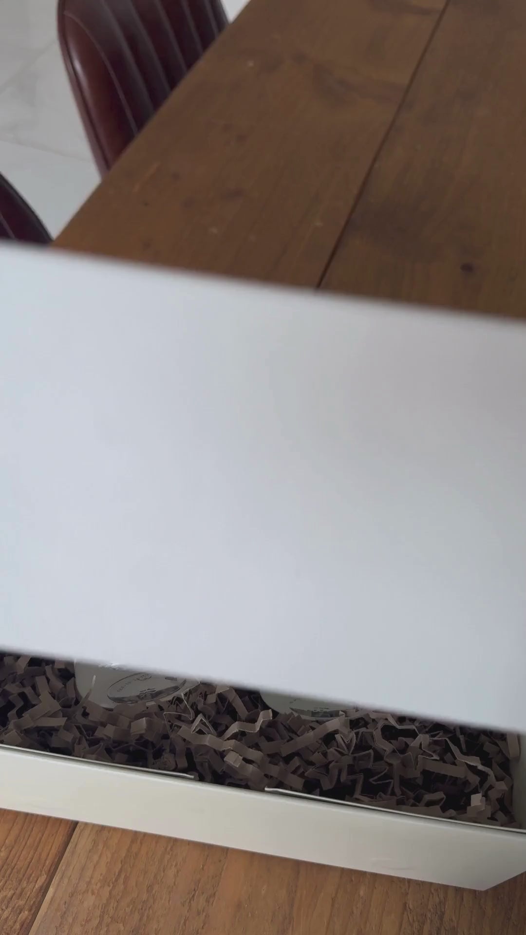 Scent Duet unboxing; ribbon untied, box opens to two curated fragrances.