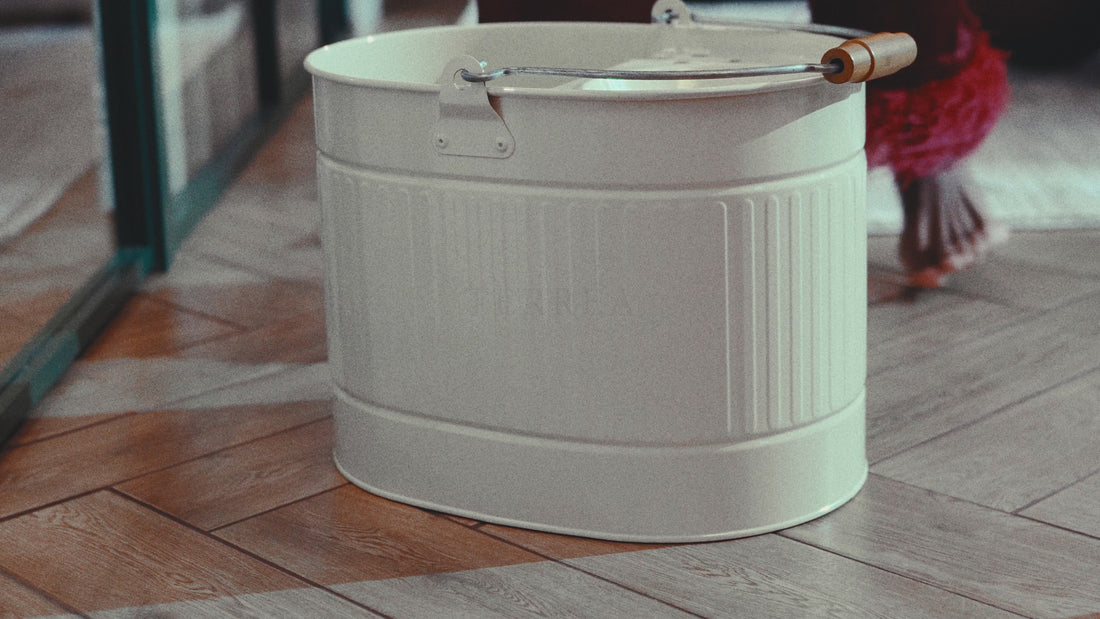Mopping the floor with Terréa Floor Delicate Cleaner, diluted with the silicone measuring cup - no-rinse ritual.
