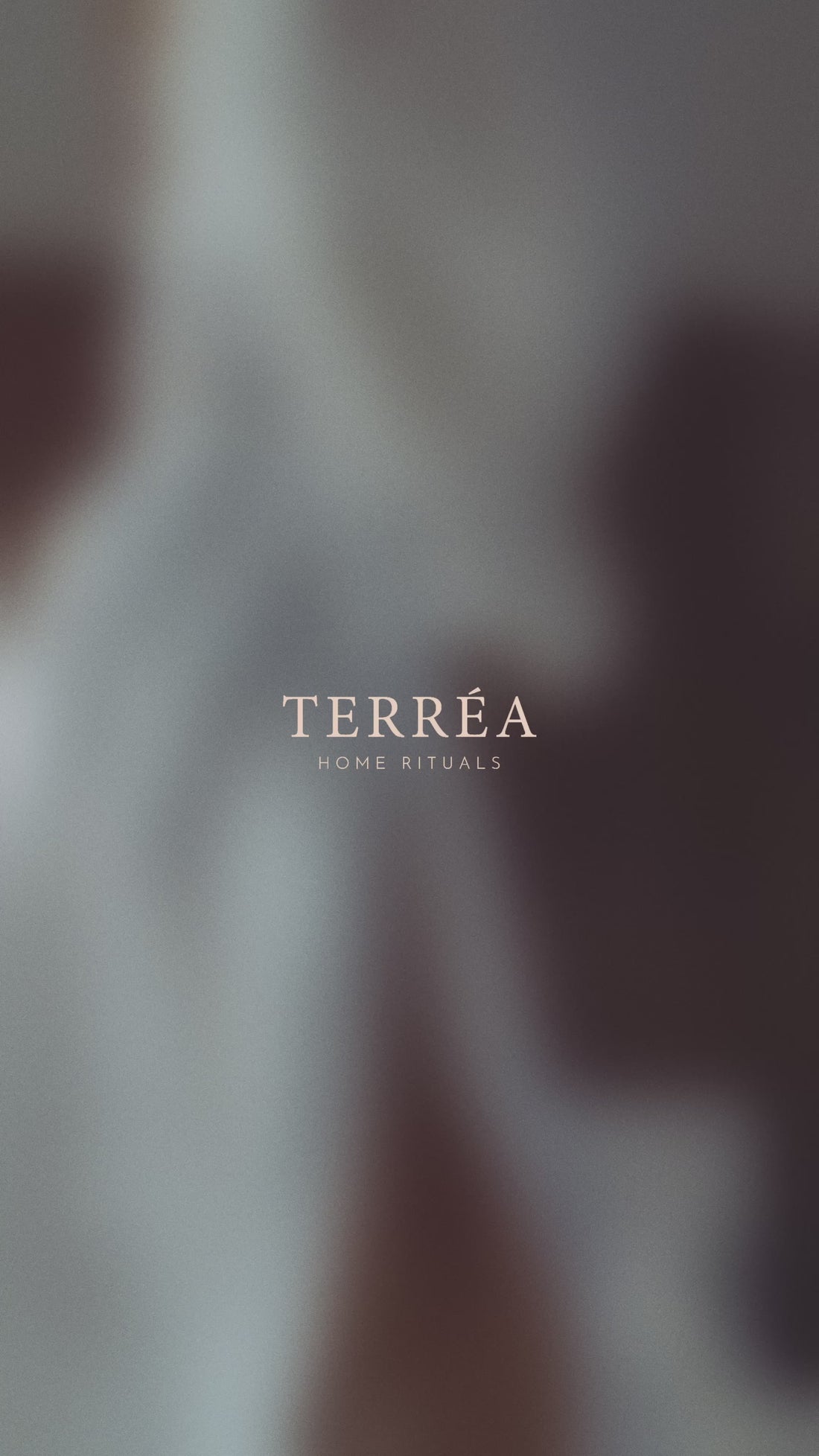 woman playfully jumps on the bed, showing the spray bottle; light, crease-easing fabric ritual.