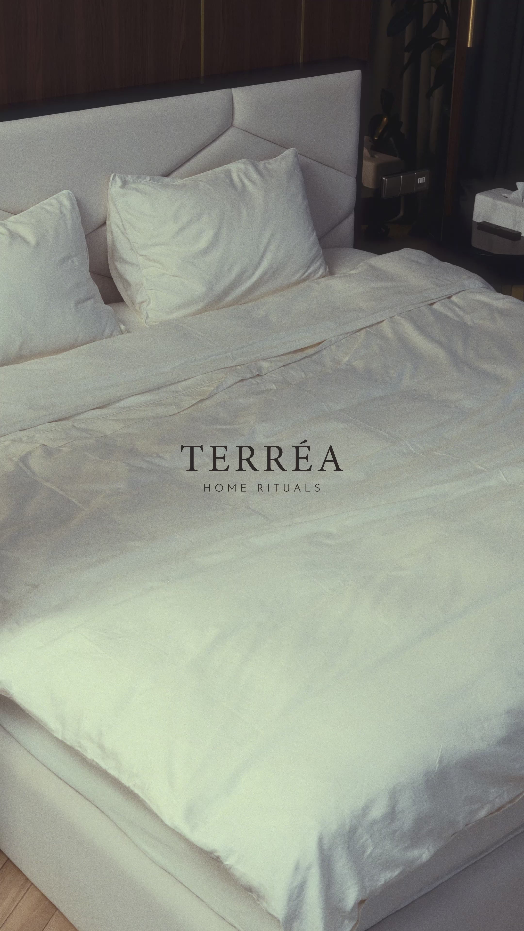 Terréa Fabric Wash & Signature Conditioner - woman falls onto fresh bed, tosses in the bottles, then gathers laundry for washing.